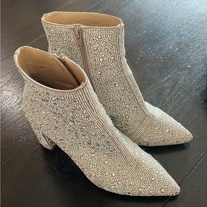 Studded booties with turquoise bottom!